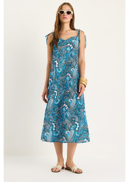 Kadın Bağlama Askılı V Yaka Cep Detaylı Desenli Midi Elbise -