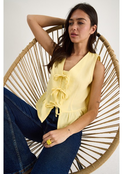 Kadın V Yaka Fiyonk Detaylı Müslin Peplum Bluz G- fiyatları