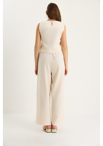 Kadın Kalın Askılı Bluz Beli Lastikli Cep Detaylı Bol Pantolonlu Keten Takım fırsatları