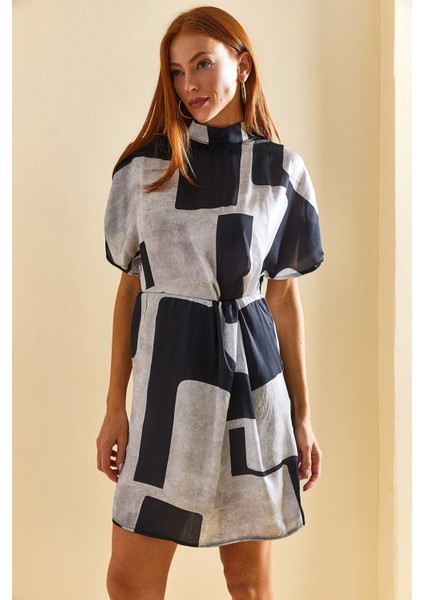 Kadın Kruvaze Yaka Eteği Astarlı Pileli Desenli Elbise fiyatları