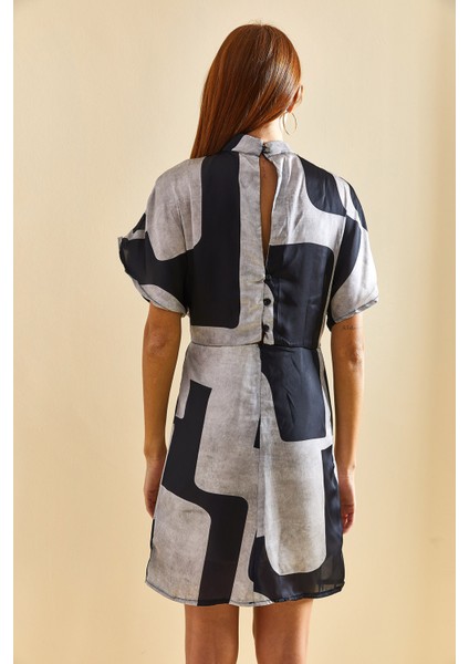 Kadın Kruvaze Yaka Eteği Astarlı Pileli Desenli Elbise fırsatları