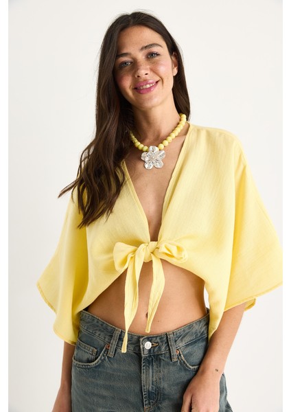 Kadın Geniş Kollu V Yaka Bağlama Detaylı Müslin Bluz modelleri