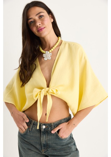 Kadın Geniş Kollu V Yaka Bağlama Detaylı Müslin Bluz fırsatları