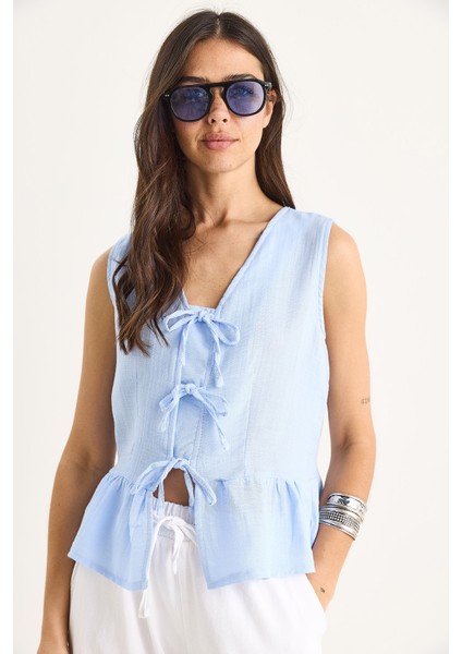 Kadın V Yaka Fiyonk Detaylı Müslin Peplum Bluz G- fiyatları