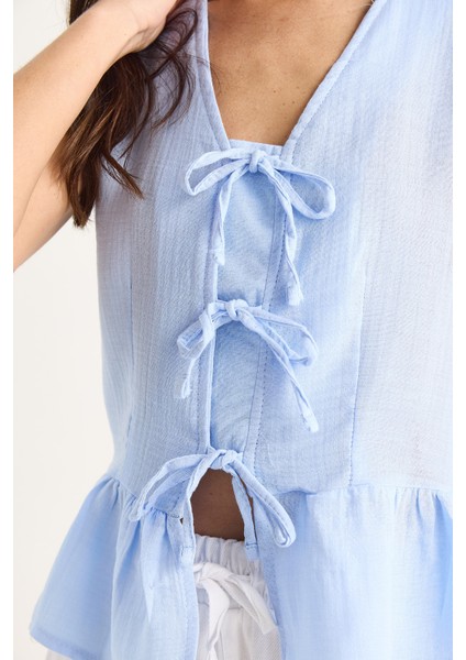 Kadın V Yaka Fiyonk Detaylı Müslin Peplum Bluz G- fırsatları