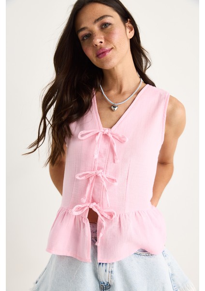 Kadın V Yaka Fiyonk Detaylı Müslin Peplum Bluz G- fiyatları