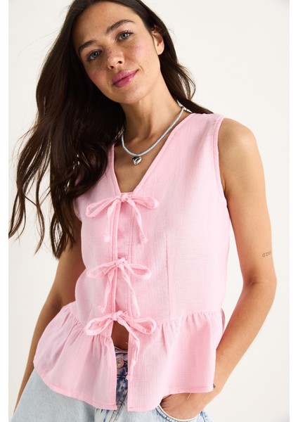 Kadın V Yaka Fiyonk Detaylı Müslin Peplum Bluz G- modelleri