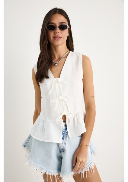 Kadın V Yaka Fiyonk Detaylı Müslin Peplum Bluz G- modelleri