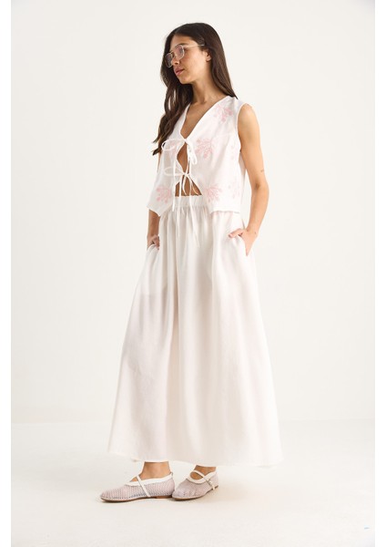 Kadın Önü Bağlamalı Nakış Işlemeli Yelek Cep Detaylı Uzun Modal Etek Takım modelleri