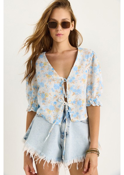 Kadın Çiçek Desenli Bağlama Detaylı Kolları Lastikli Müslin Bluz