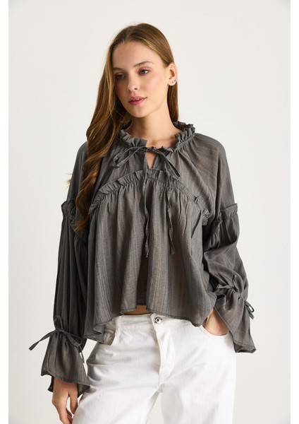 Kadın Bağlama Detaylı Balon Kol Salaş Gofre Bluz fiyatları