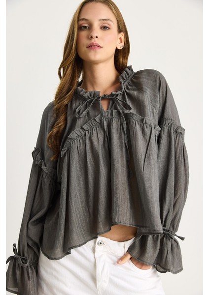 Kadın Bağlama Detaylı Balon Kol Salaş Gofre Bluz fırsatları