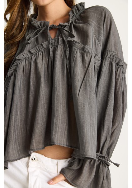 Kadın Bağlama Detaylı Balon Kol Salaş Gofre Bluz indirimleri