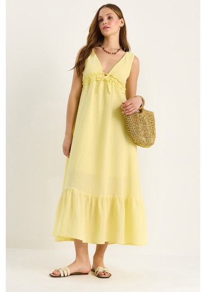 Kadın V Yaka Bağlama Detaylı Astarlı Müslin Elbise fırsatları