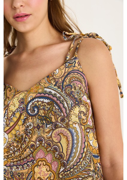 Kadın Bağlama Askılı V Yaka Cep Detaylı Desenli Midi Elbise - indirimleri