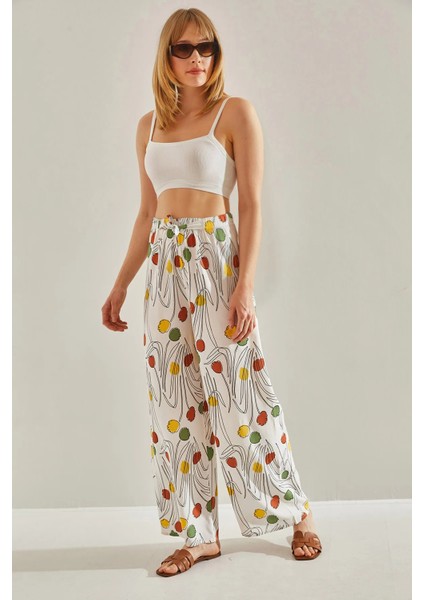 Kadın Desenli Beli Lastikli Bağlamalı Dökümlü Keten Palazzo Pantolon modelleri