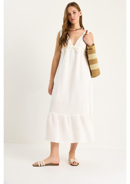 Kadın V Yaka Bağlama Detaylı Astarlı Müslin Elbise fiyatları