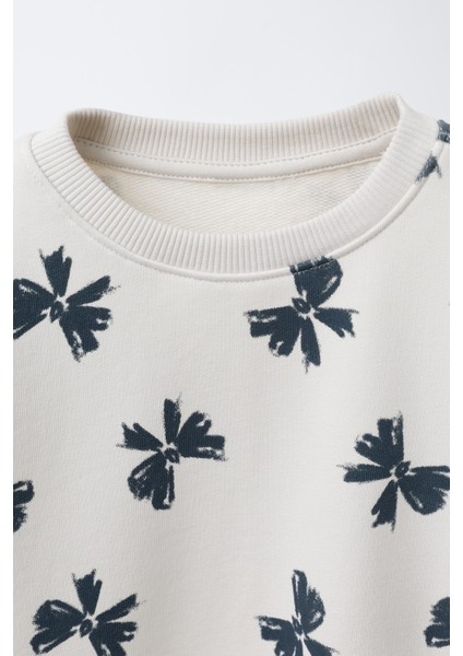 Kız Çocuk Pamuklu Krem Fiyonk Desenli Sweatshirt ve Tayt Takım modelleri