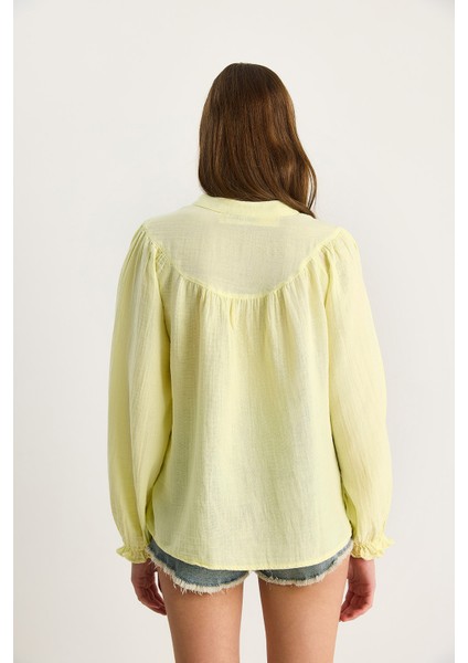 Kadın Kolları Lastikli Düğmeli Rahat Müslin Gömlek