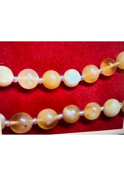 17,5 Gram Damla Kehribar Kolye - Taneler Ortalama 6 mm Çapında Açık Halde Toplam Uzunluk 64 cm modelleri