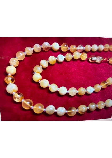 17,5 Gram Damla Kehribar Kolye - Taneler Ortalama 6 mm Çapında Açık Halde Toplam Uzunluk 64 cm fırsatları