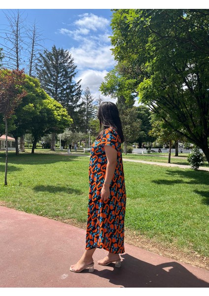 Turuncu Desenli V Yaka Salaş Yazlık Elbise – Asimetrik Kesim 38-50 Beden Uyumlu modelleri