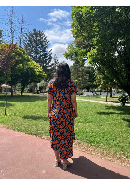 Turuncu Desenli V Yaka Salaş Yazlık Elbise – Asimetrik Kesim 38-50 Beden Uyumlu fırsatları