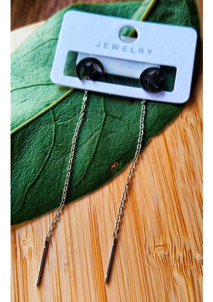 Gümüş Renk Metalik Ay Yıldız Figürlü Sallantılı Küpe