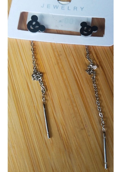 Gümüş Renk Metalik Figürlü Sallantılı Küpe