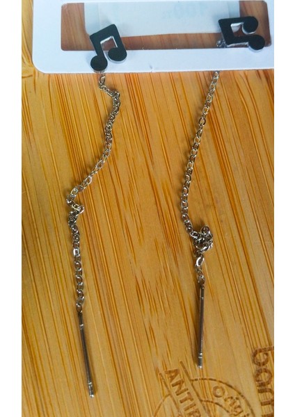 Gümüş Renk Metalik Figürlü Sallantılı Küpe fiyatları