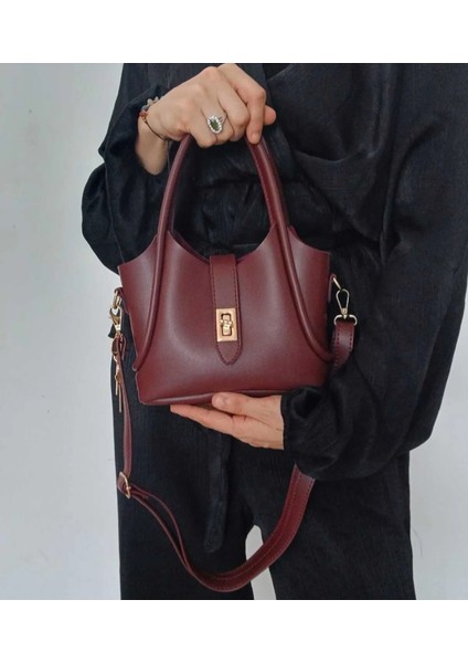 Charmlı Bordo Suni Deri Yavrulu El ve Omuz Çantası indirimleri