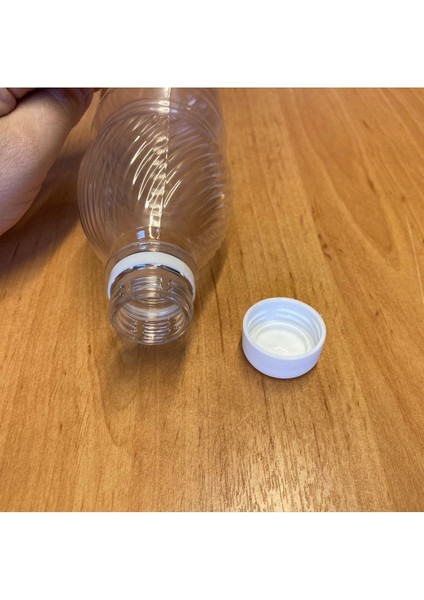 Beyaz Kilitli Kapaklı 500 ml Plastik Şişe, Dayanıklı ve Kullanışlı (1 Adet) fiyatları