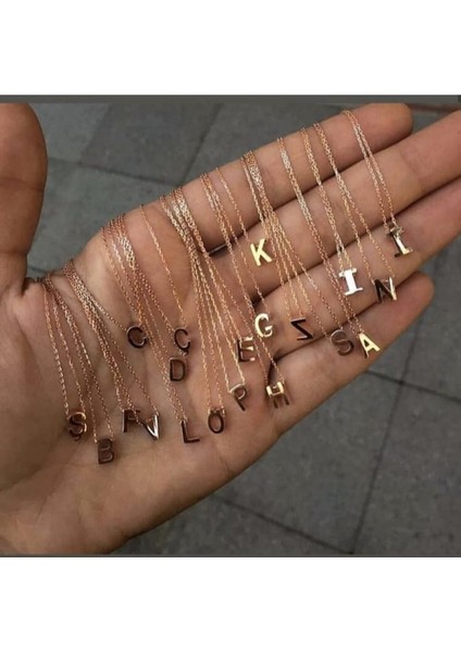 Gümüş 3 Boyutlu U Harf Kolye fiyatları