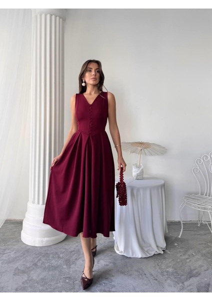 Dore Pileli Düğme Detay Midi Elbise fırsatları