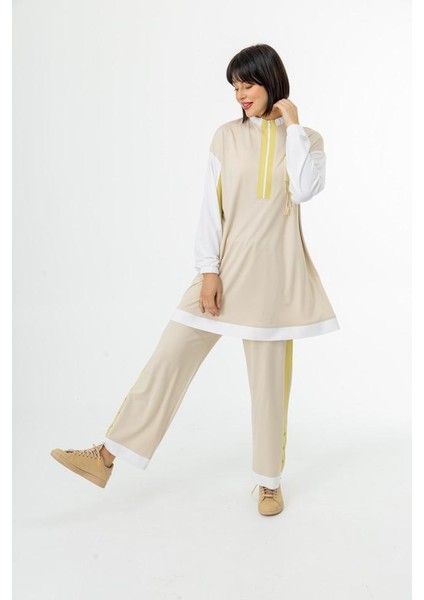 25106 Önü Yarım Fermuarlı Yakası ve Kol Ucu Lastikli Göğsü Taş ve Motif Detaylı Pantolonun Beli Lastikli Oversize Spor Ikili Takım #02-25# fırsatları