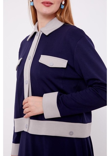 130993 Etekli Takım Önü Çıtçıt Detaylı Göğüs Cep Görünümlü Kolu Manşetli Eteğin Beli Lastikli Spor Etekli Takım fırsatları