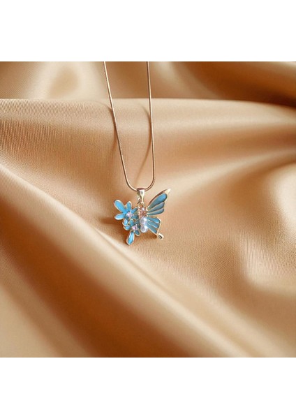 Mavi Çiçekli Kelebek Kolye – Çelik, Altın Kaplama, Inci Detaylı modelleri