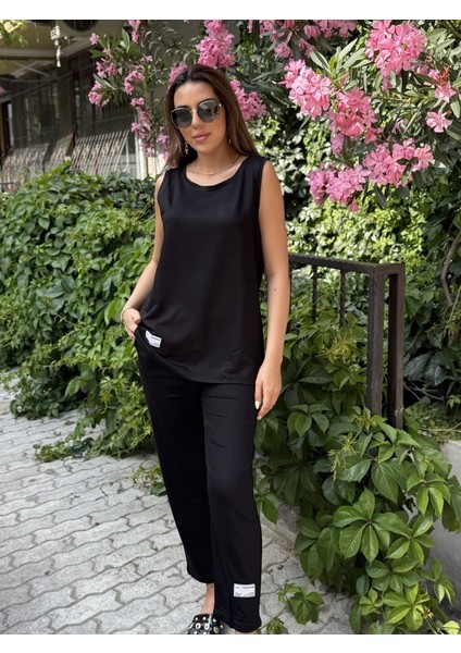 Mottisfashion Kadın Askılı Yuvarlak Yaka Viskon Iki Iplik Bluz ve Eşofman Altı Ikili Takım modelleri