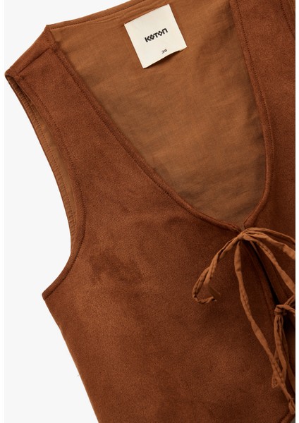 Slim Fit Önden Bağlama Detaylı Fiyonklu Suni Süet Crop Yelek