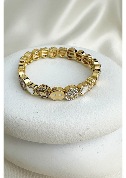 Özel Seri Altın Rengi Gülen Yüz Kalp Detay Taşlı Lastik Bileklik