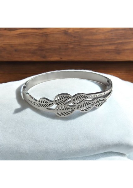 Yaprak Detaylı Taşlı Zarif Çelik Kelepçe