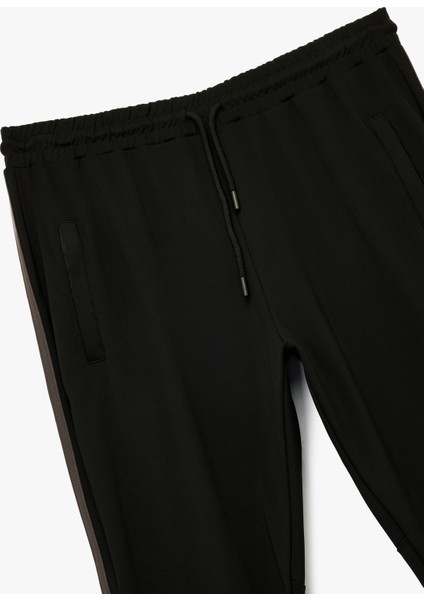 Beli Bağcıklı Biyeli Cep Detaylı Spor Eşofman Altı modelleri