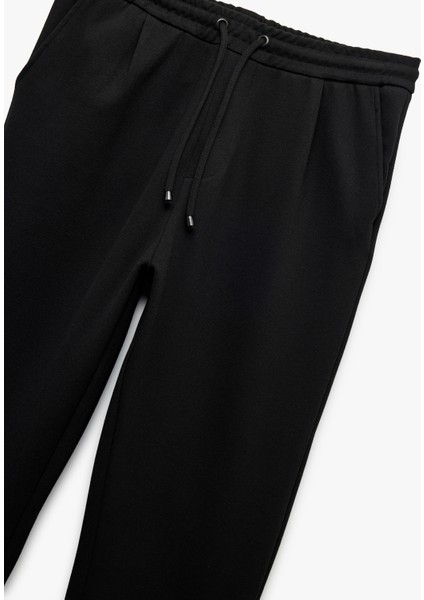 Beli Bağcıklı Cepli Katlamalı Paça Pantolon Görünümlü Eşofman Altı indirimleri