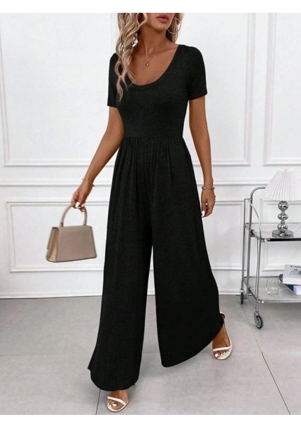 Kadın Kısa Kollu Yuvarlak Yaka Geniş Paçalı Bürümcük Tulum indirimleri