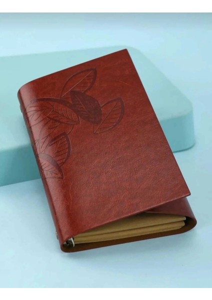 Yaprak Baskılı Deri Kapaklı Özel Tasarım Hediyelik Deri Kaplı Ajanda Anı Defteri Not Defteri Bordo Ithal Ürün 19X13CM fiyatları