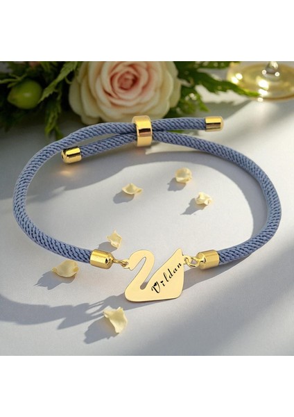 Altın Plakalı 14 Ayar Vildan Ismine Özel Mavi Ipek Örgülü Kuğu Kuşu Figürlü Hediye BILEKLIK-603ISIM fiyatları