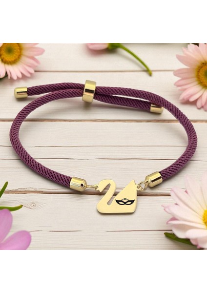 Altın Plakalı 14 Ayar Bal Maske Temalı Mor Örgülü Kuğu Kuşu Figürlü Hediye BILEKLIK-605SEMBOL fiyatları