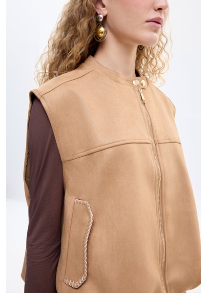 Zikzak Dikiş Detaylı Beli Lastikli Süet Görünümlü Yelek Bej fırsatları