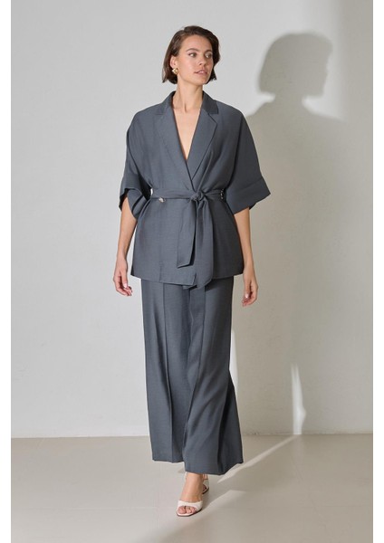 Petrol Düğme Ve Belden Bağlama Detaylı Geniş Kalıp Yarım Kollu Ceket fiyatları