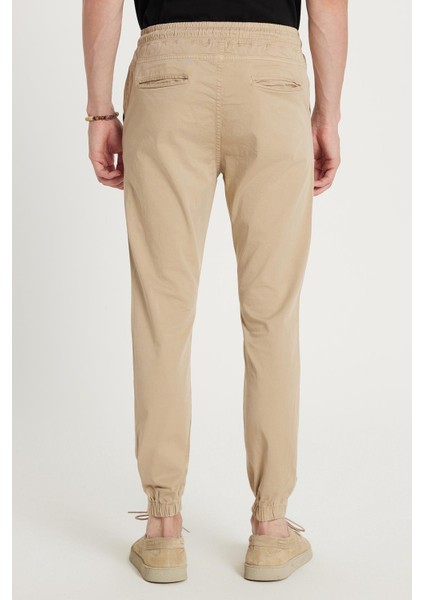 Erkek Slim Fit Dar Kesim Pamuklu Normal Bel Lastikli Paça Bej Renk Pantolon indirimleri